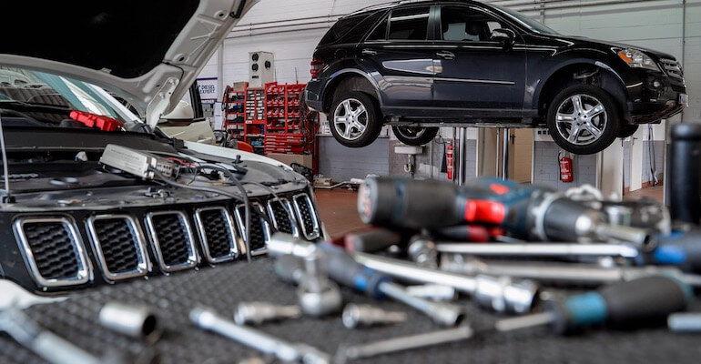 Taller mecánico en El Salvador — descuentos en mantenimiento vehicular con tarjetas bancarias 2026